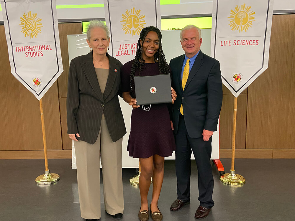 Alexia Ayuk posing with her scholarship award