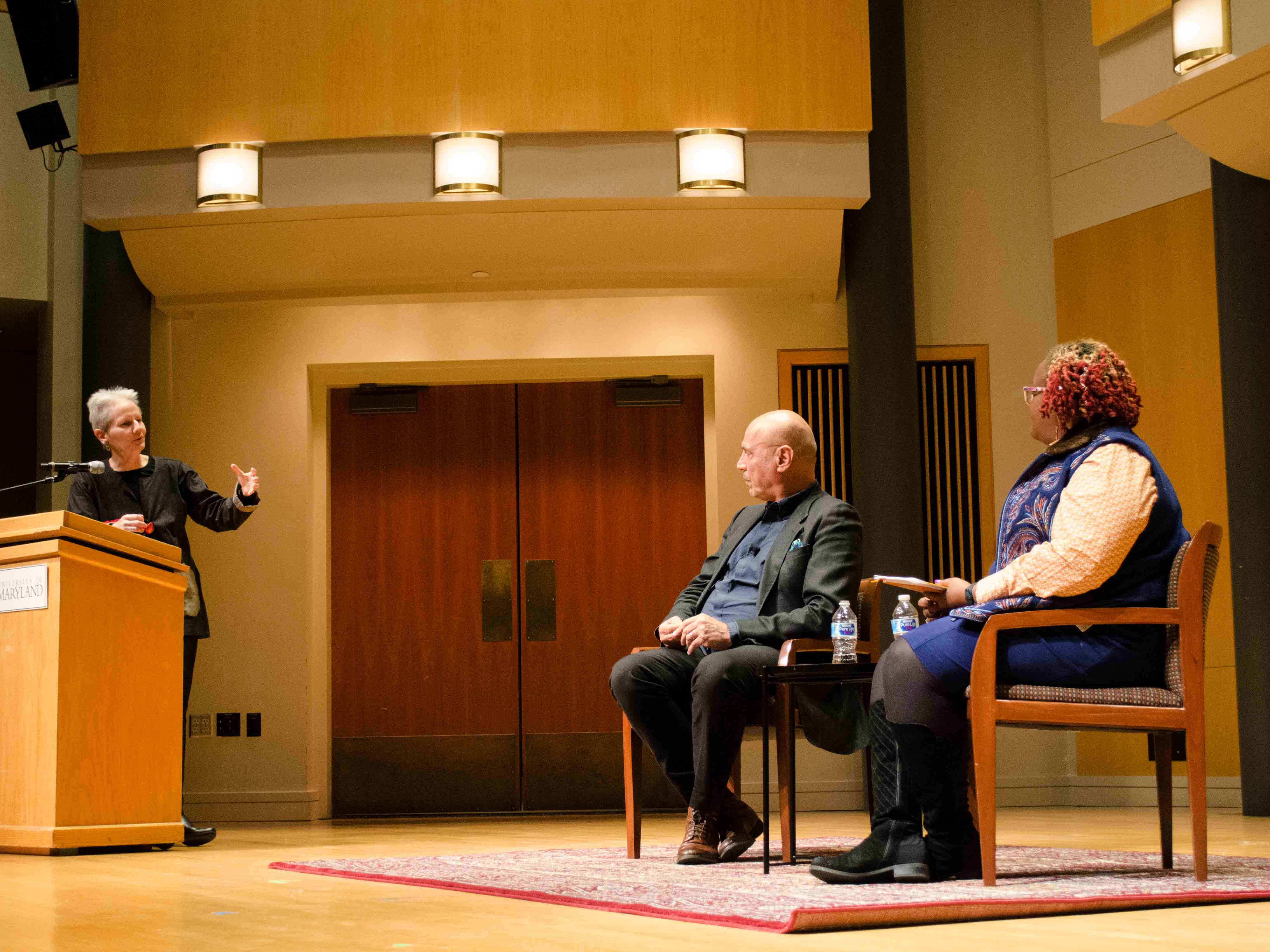 Andy Shallal (pictured at right with Scholars Executive Director Marilee Lindemann and event moderator Psyche Williams-Forson)