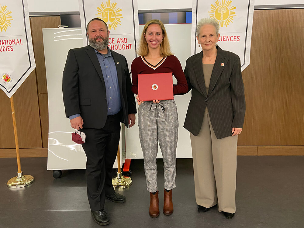 Sofia Grossman posing with her award