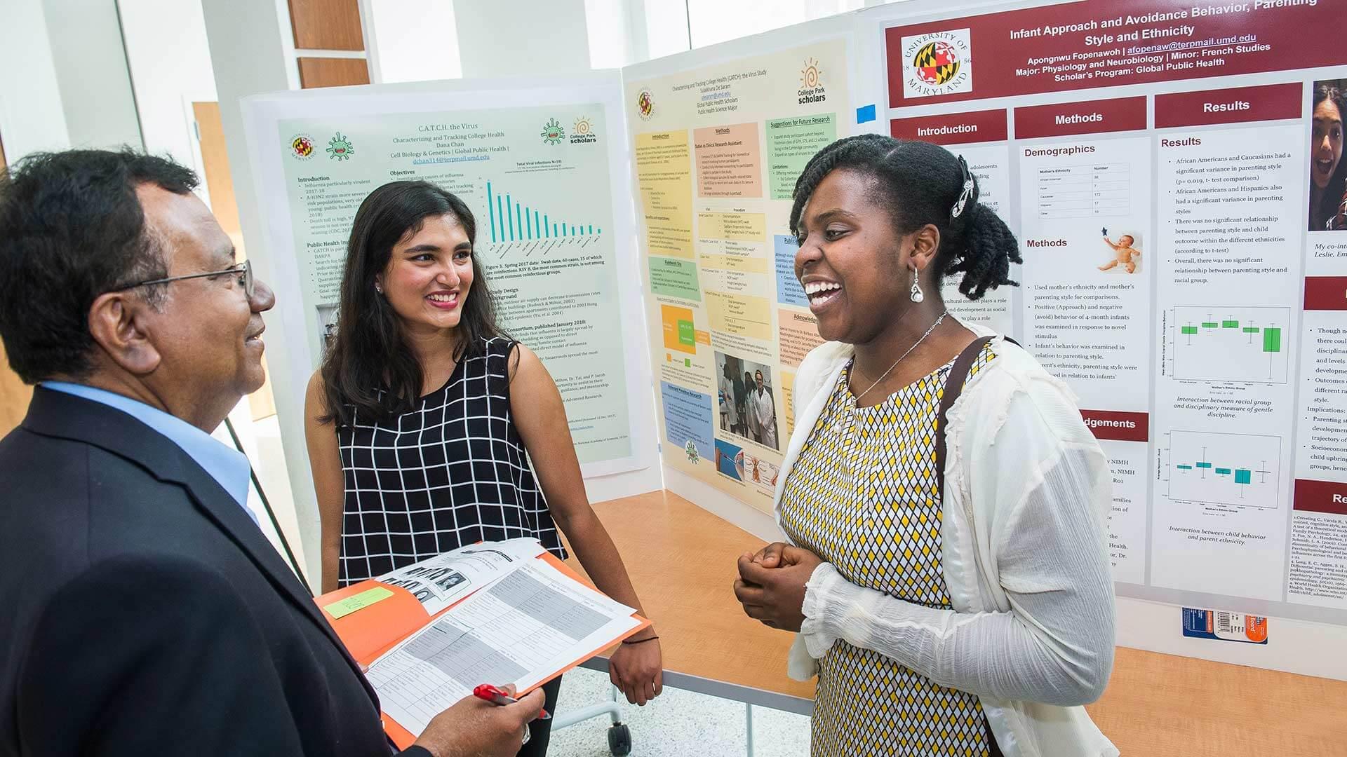 Students and Teacher talking during Academic Showcase