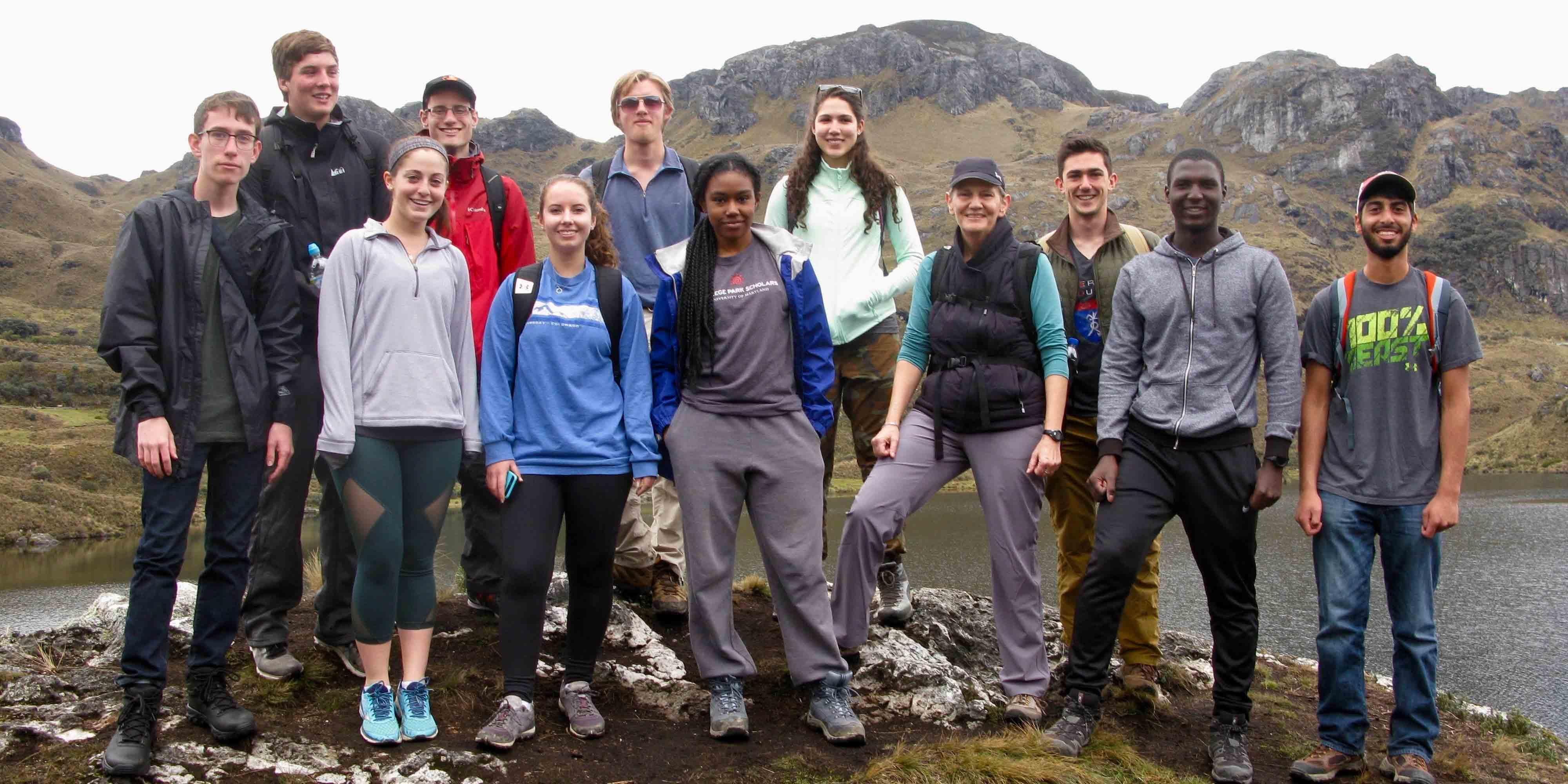 Marilee Lindemann and students posing on hilltop in Ecuador