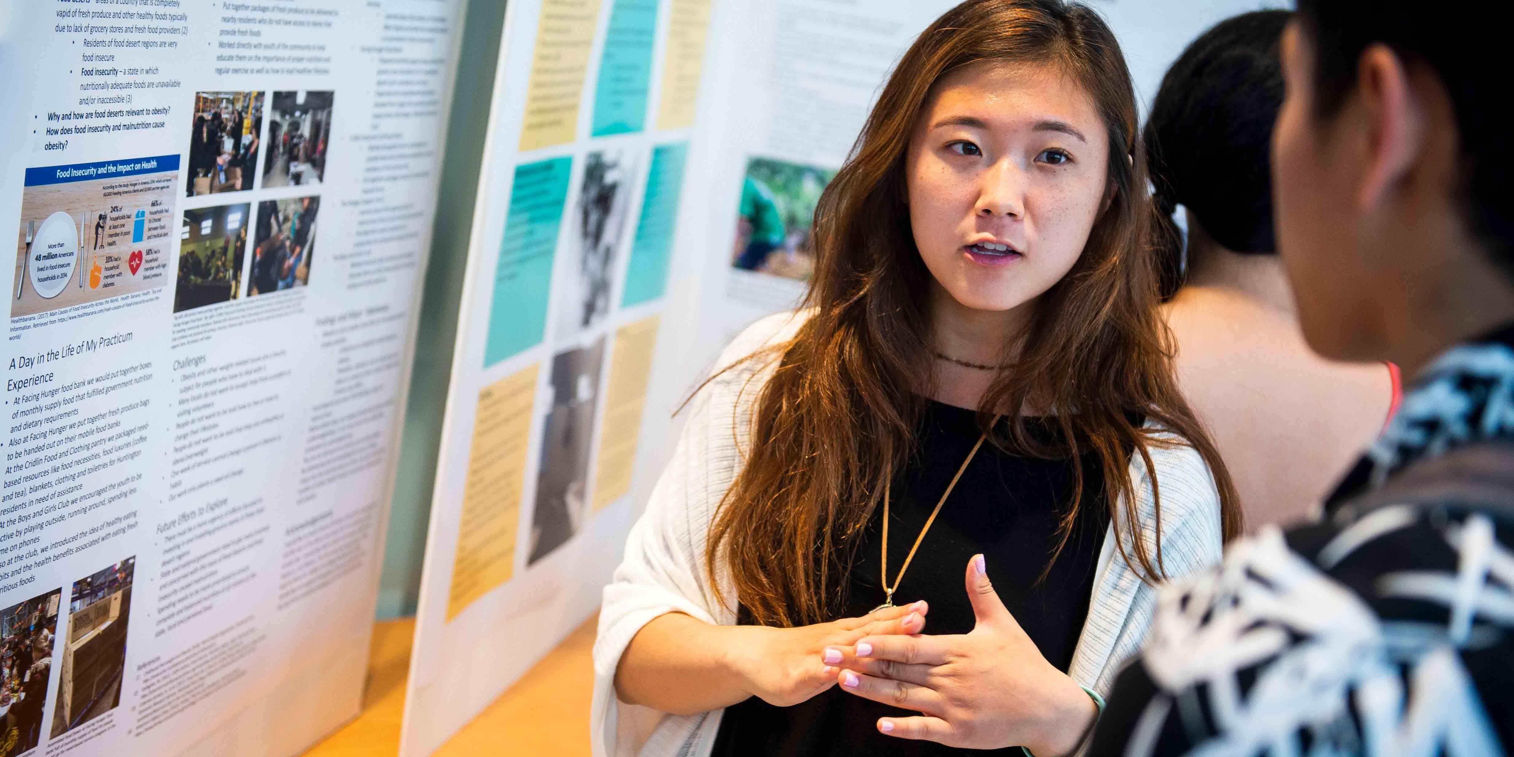 Student presents Academic Showcase poster