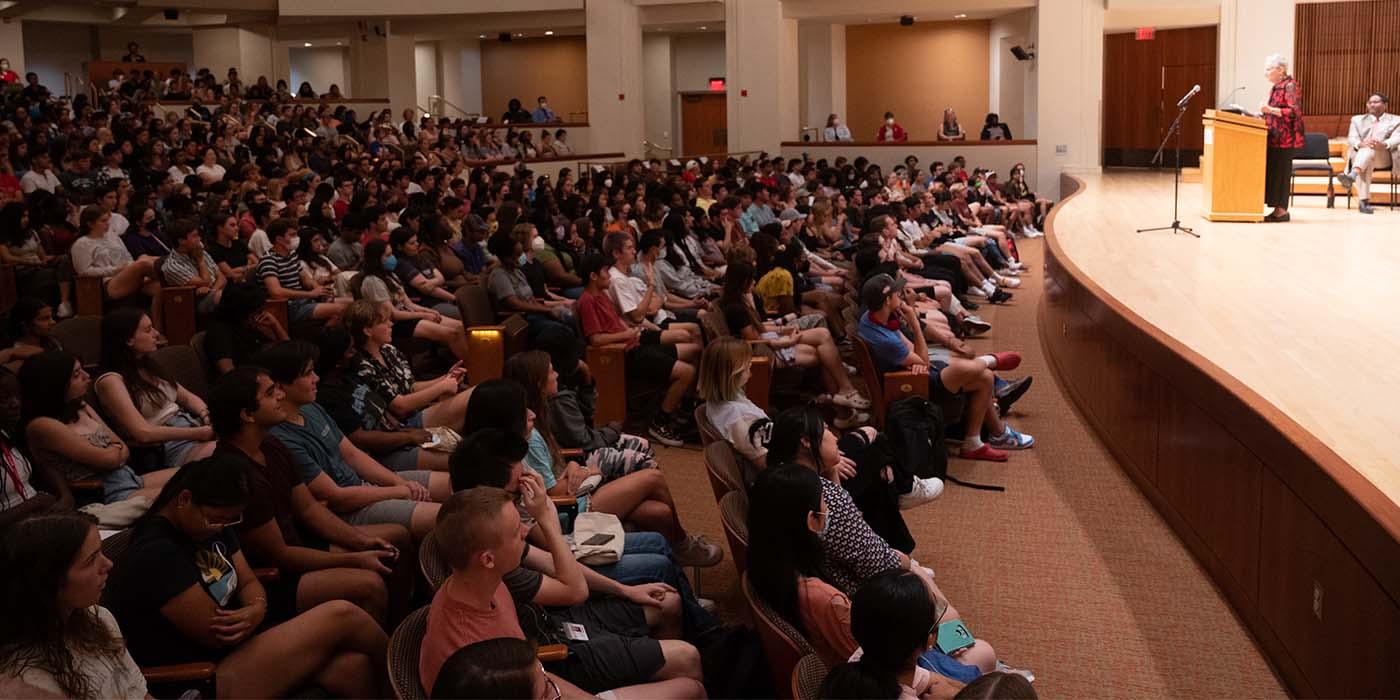 convocation audience facing stage with speaker