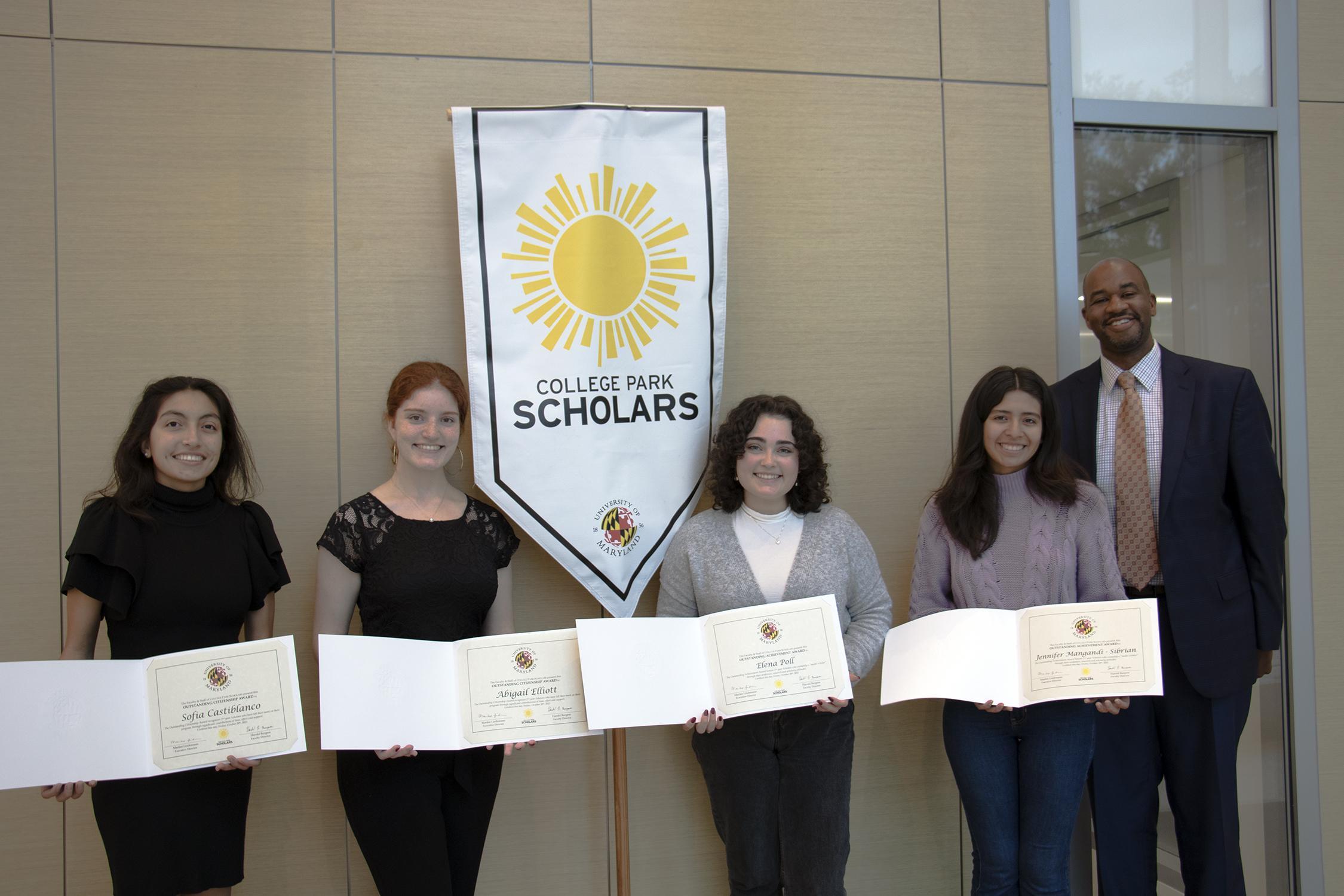 Arts program winners with certificates 